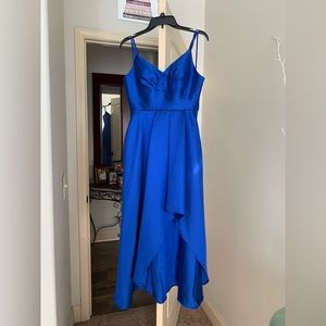 A beautiful blue prom dress. Alterations have been made. Made to fit 5ft junior.
